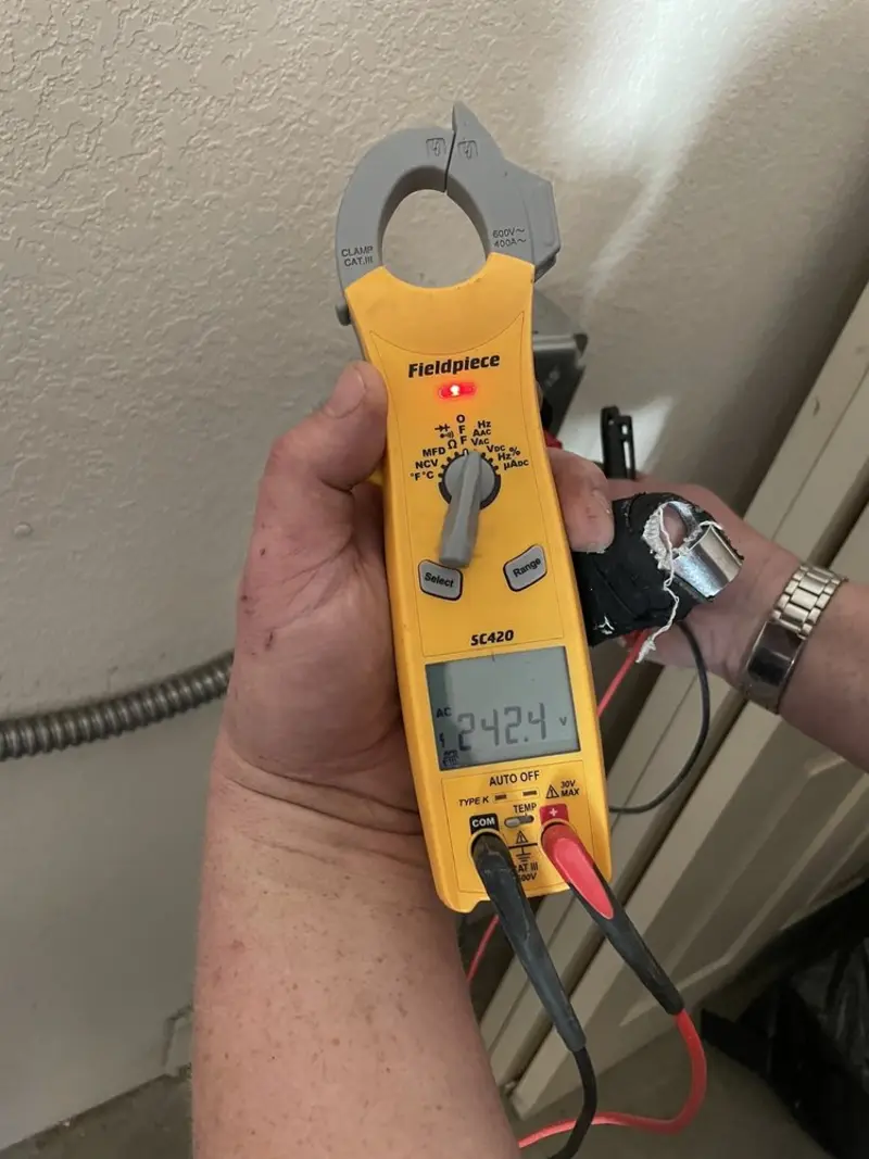 Voltage testing with clamp meter during Circuit Breaker Repair in Batesville